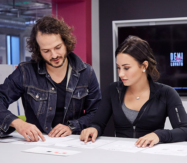 Demi Lovato at Fabletics designing outfits