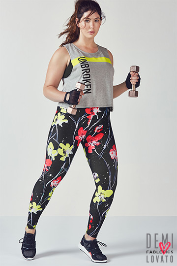 Model wearing Fabletics and working out